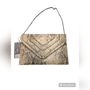 Jennifer lopez snake skin clutch